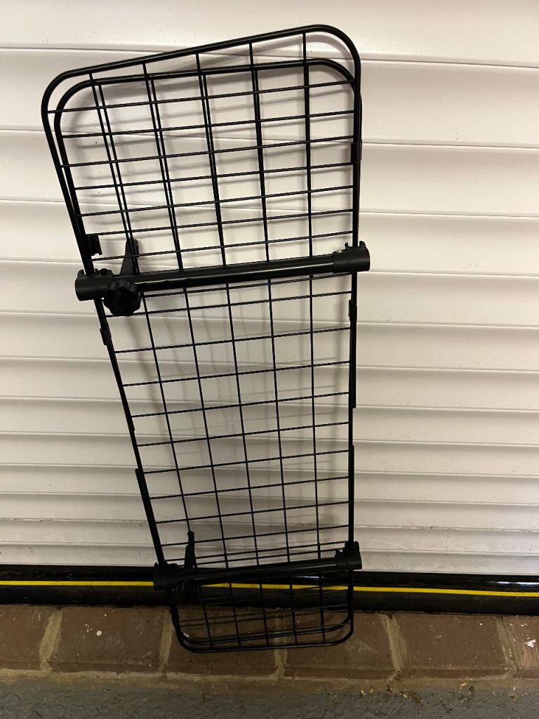 Metal pet barrier for boot/car seat 