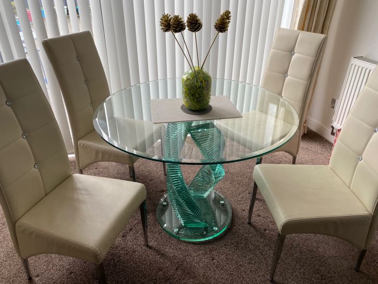 Stylish Glass Dining Table with Unique Base – Good Condition