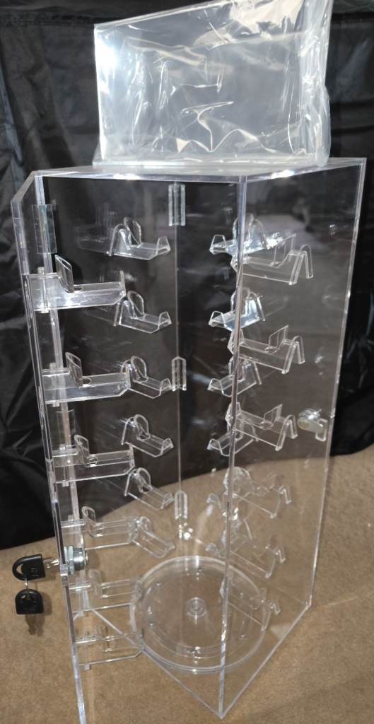 Sturdy glasses display case with two security locked doors and 4 keys, holds 24 glasses