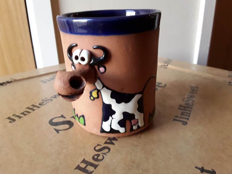 New. Unusual 3D studio pottery cow cup, mug.