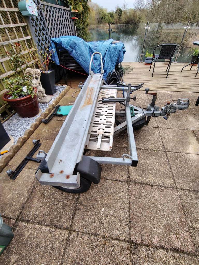 Motorcycle trailer ArmitagesTransverse sideloading compact storage 