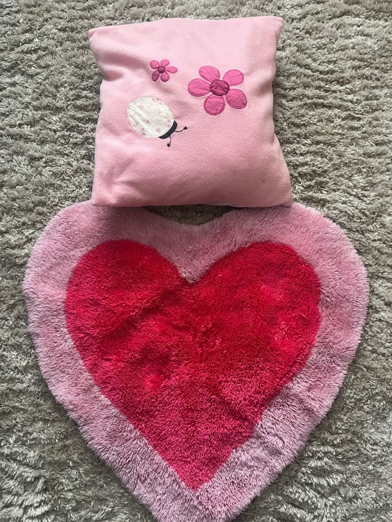 Pink heart rug and pink ladybug cushion 