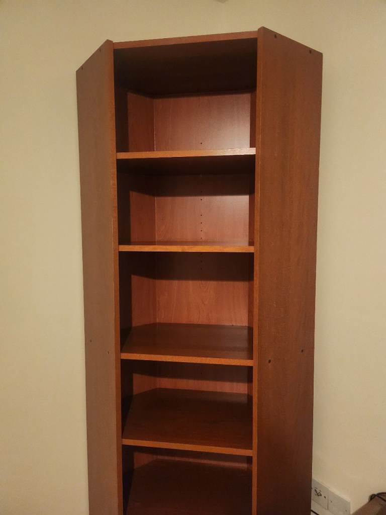 Old-style Ikea billy corner bookcase in cherrywood finish