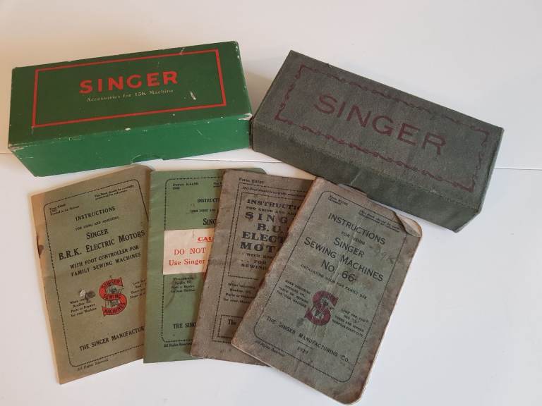 Vintage Singer Sewing Machine Instructions and Accessories.
