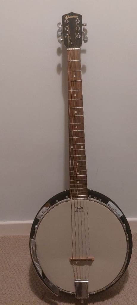 Banjo guitar with bag