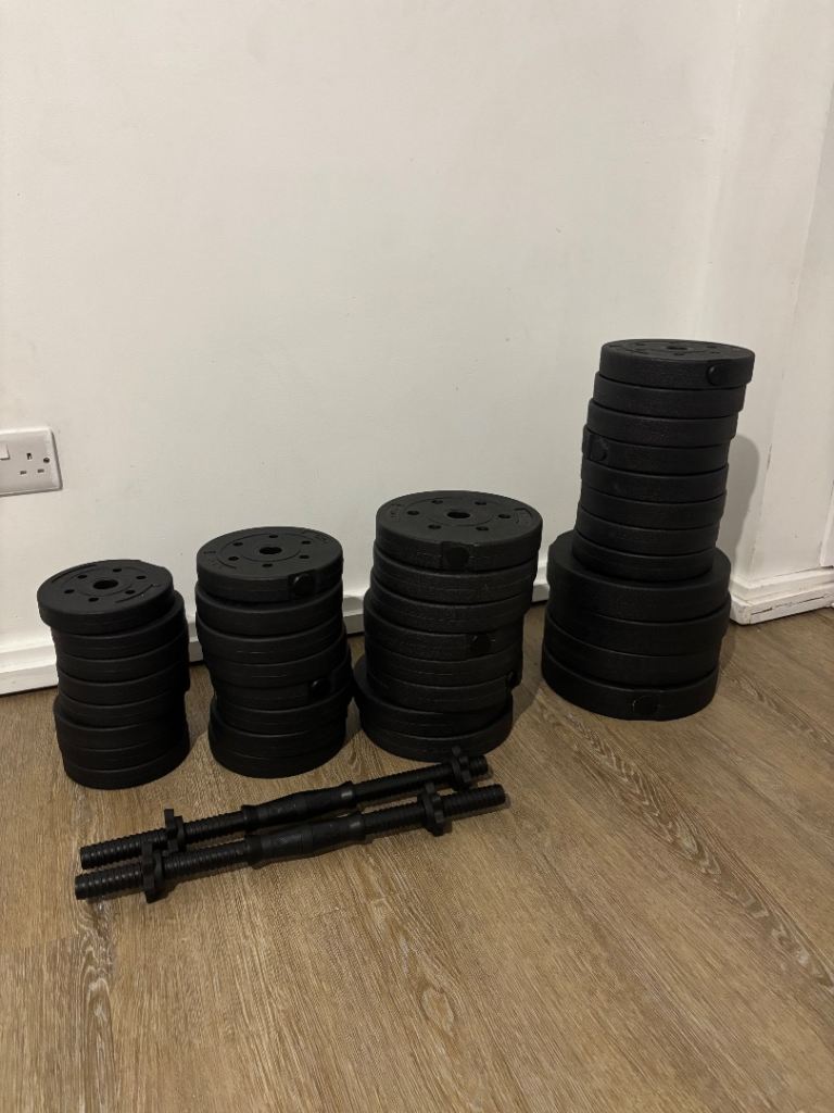 brand new weight plates 76kg worth and two dumbbell