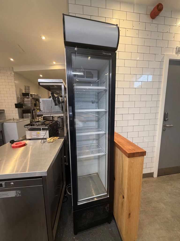 Tall Black Display Fridge with Glass Door – Good Condition