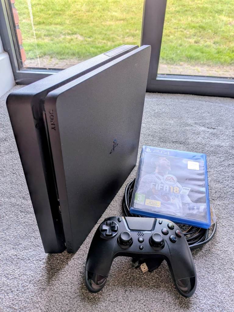 PS4 Slim in Impeccable, Factory-sealed Condition with Controller, Leads and Game