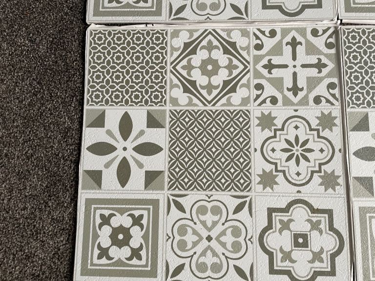 NEW…9 SELF-PATTERNED SELF ADHESIVE FLOOR TILES.   IP1