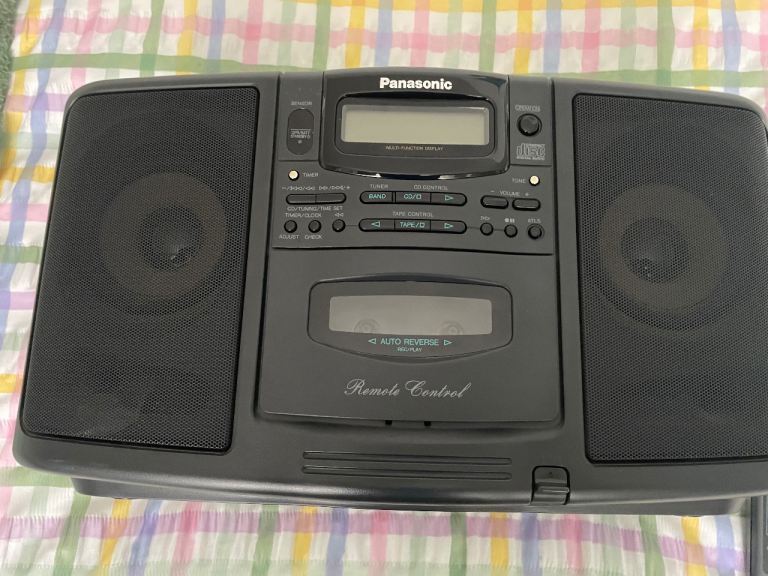 Panasonic CD Radio Tape Comes with remote control.