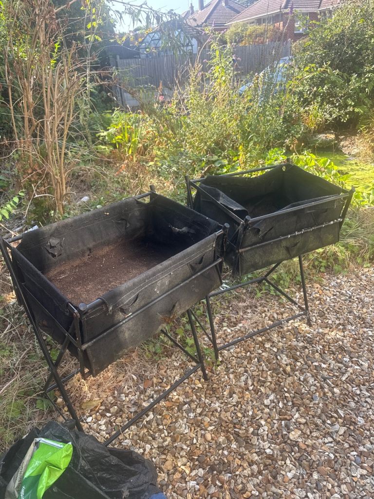 Free two raised garden planters old but work fine 
