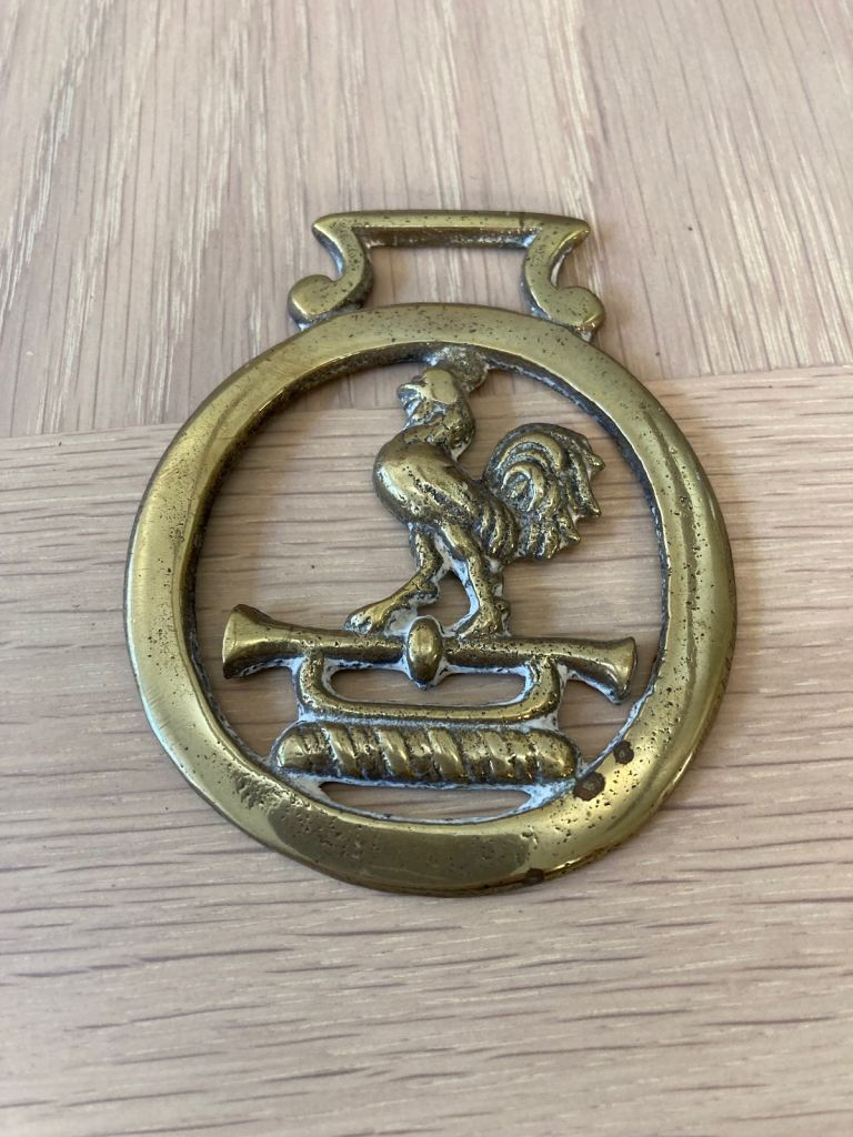 Two horse brasses