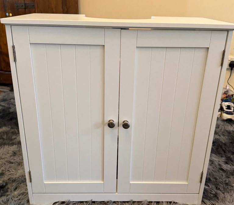 Under sink storage cabinet 