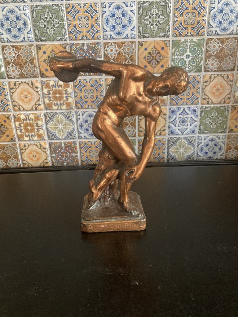 Vintage bronzed metal statue of a Greek Discobol discus thrower