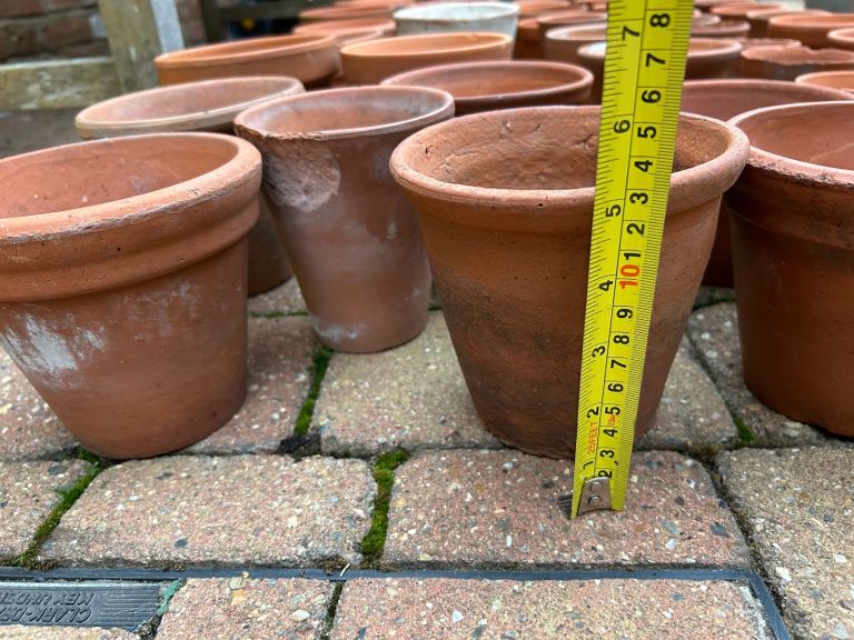 Selection of small and medium vintage terracotta pots