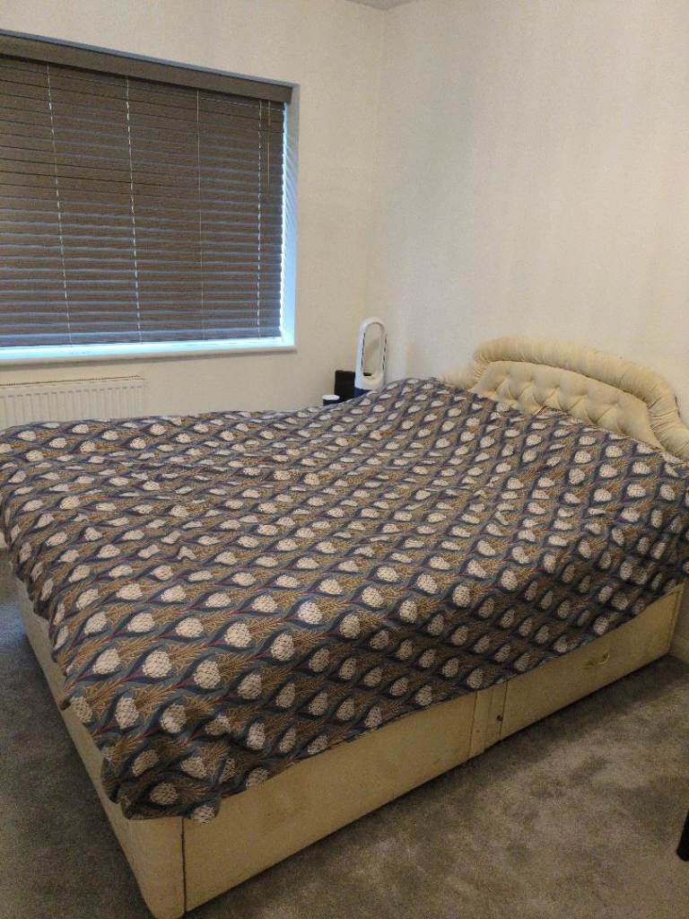 Free double bed with storage draws