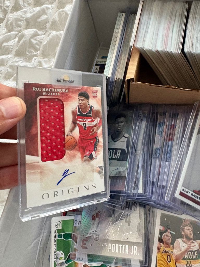 Hundreds of NBA and football cards 