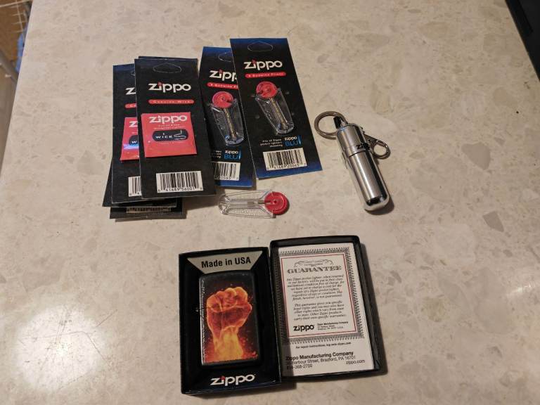 Genuine ZIPPO Lighter FLAMING FIST fire fuel canister wicks flints bundle