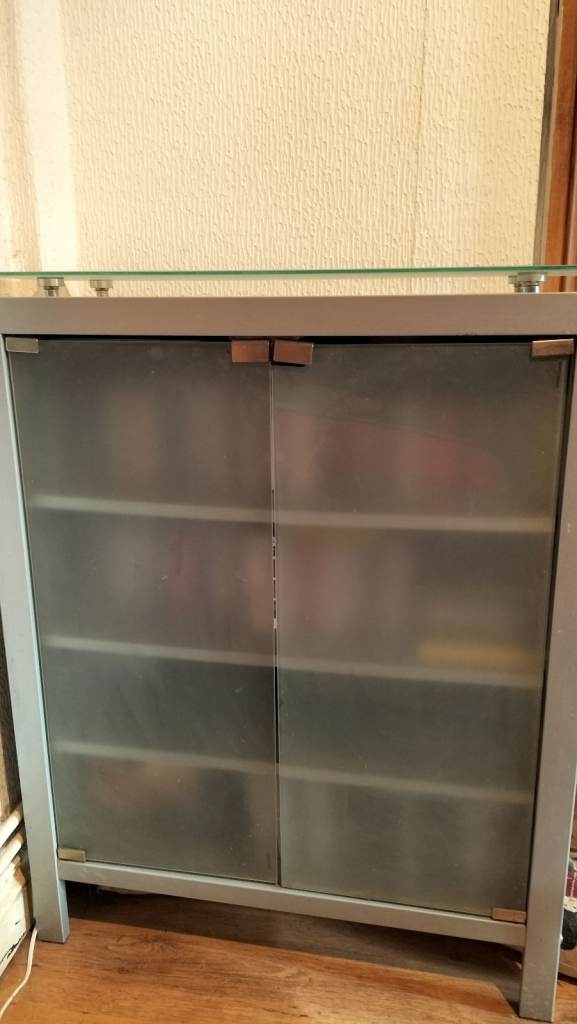 Chunky smoked glass storage cabinet 