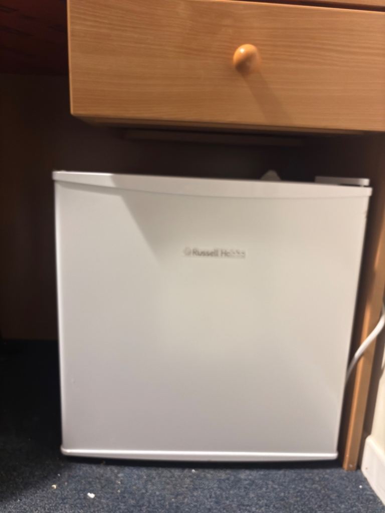 small white fridge with freezer