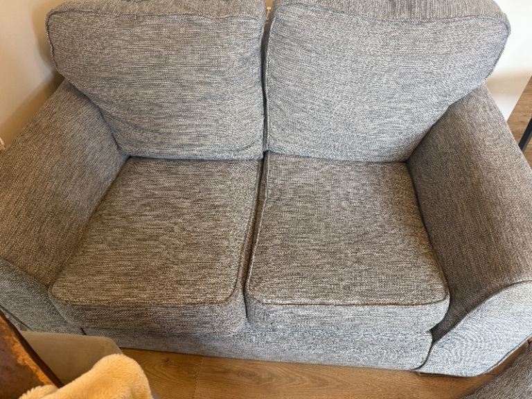 Grey two seater sofa