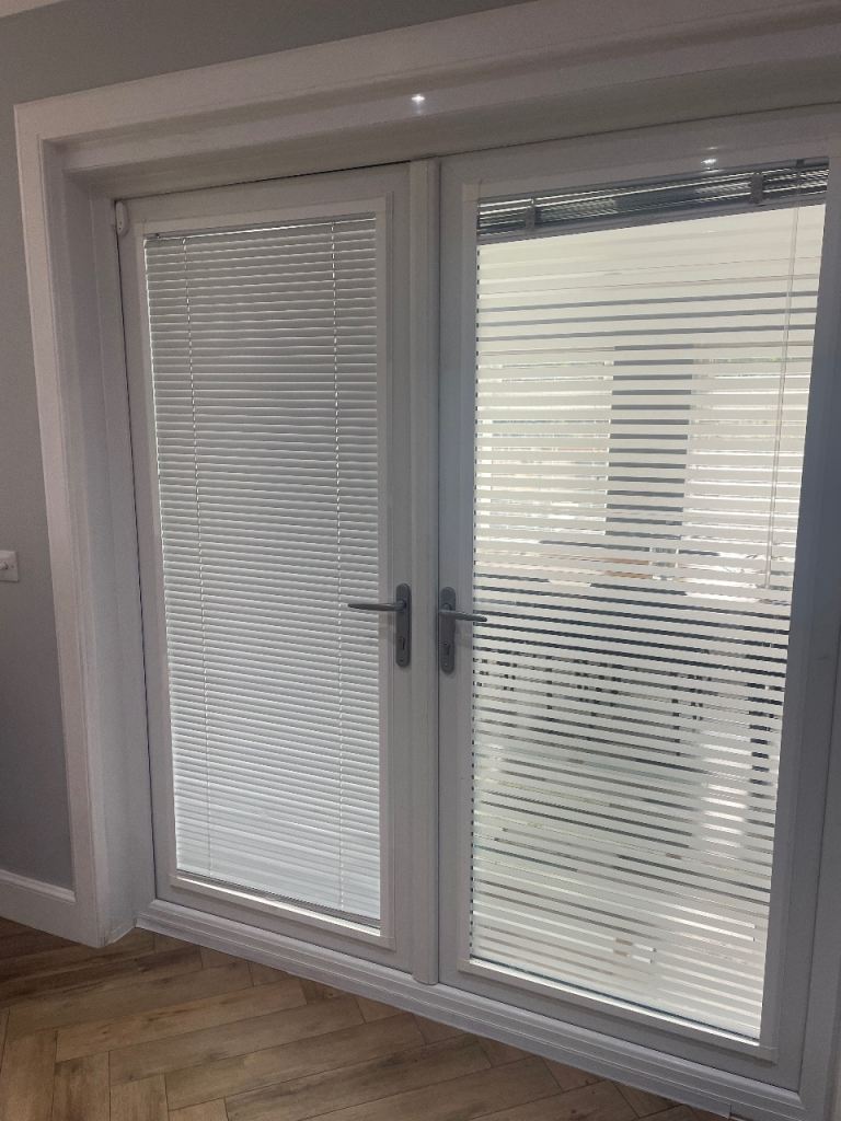 White UPVC French Doors with Integrated perfect fit blinds. Excellent condition.