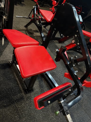 image for gym equipment - plate loaded lying ham curl