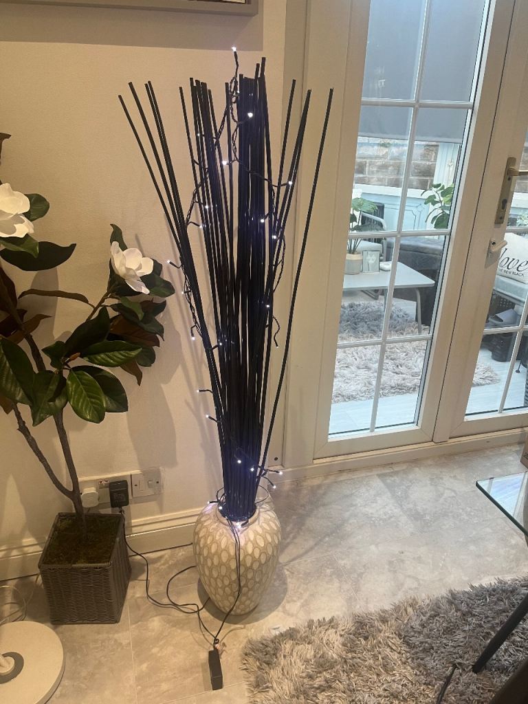 Reduced Heavy cream Vase with black wooden rods with lights