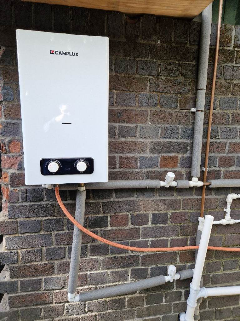 Camplux water heater, bottled gas, battery ignition, hot water to 2 points, as good as new