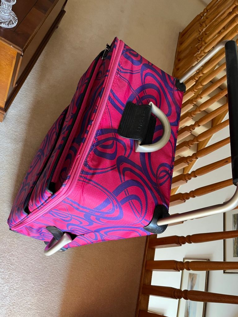 Two Sub-ø-G lightweight suitcases. Medium and Large.