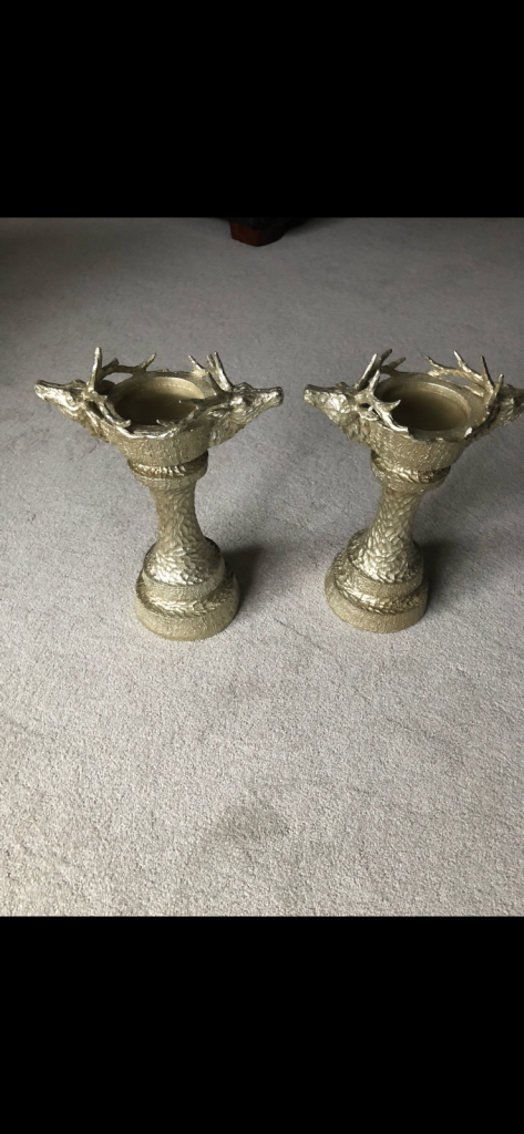 2 x stag candle sticks/ holders 