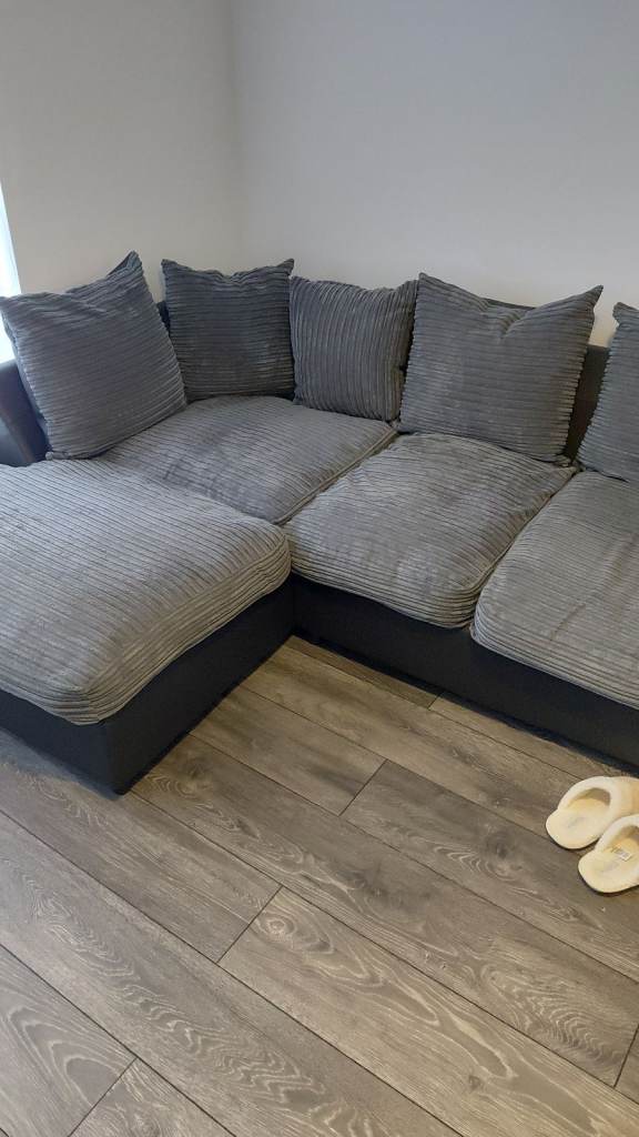 Black leather and grey materal small corner sofa vgc and comfi pet and smoke free home 