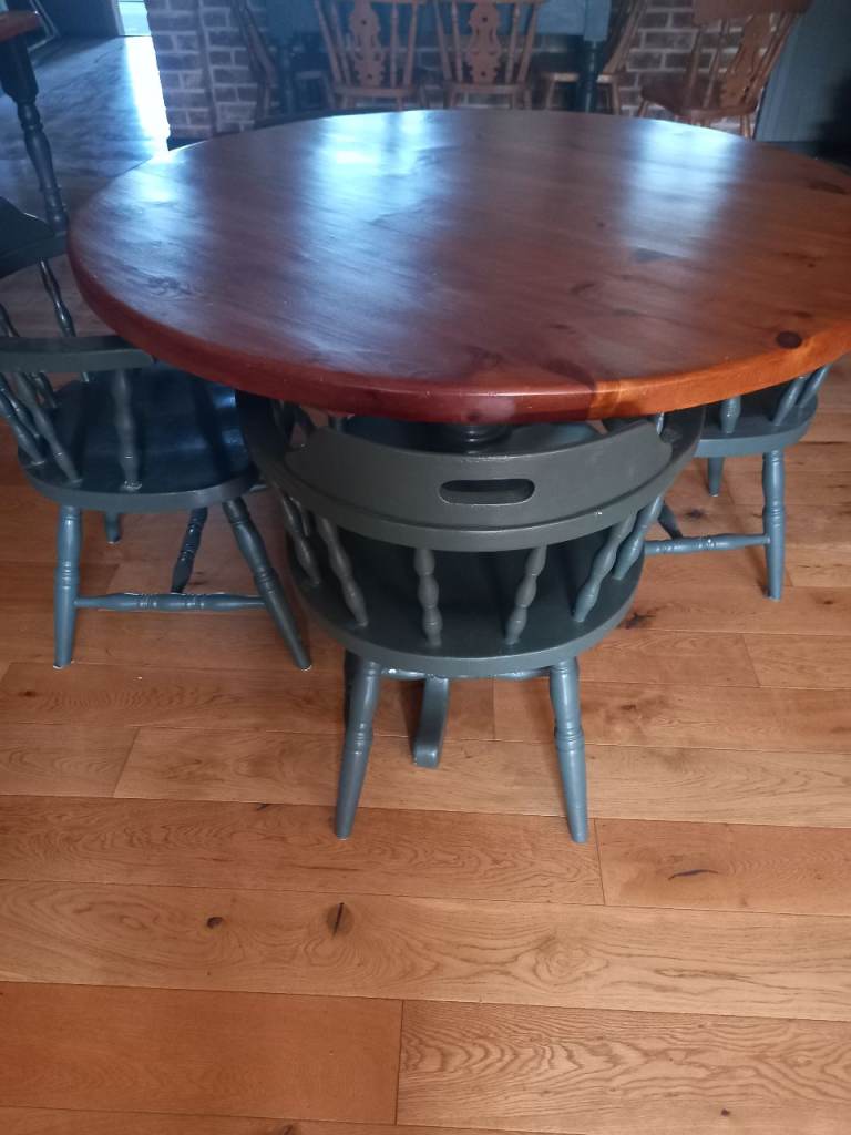Pine table and 4 captains chairs