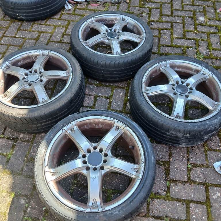 german asw 17 inch universal alloys 4 or 5 stud good tyres 215/40/17 2 rims have dents