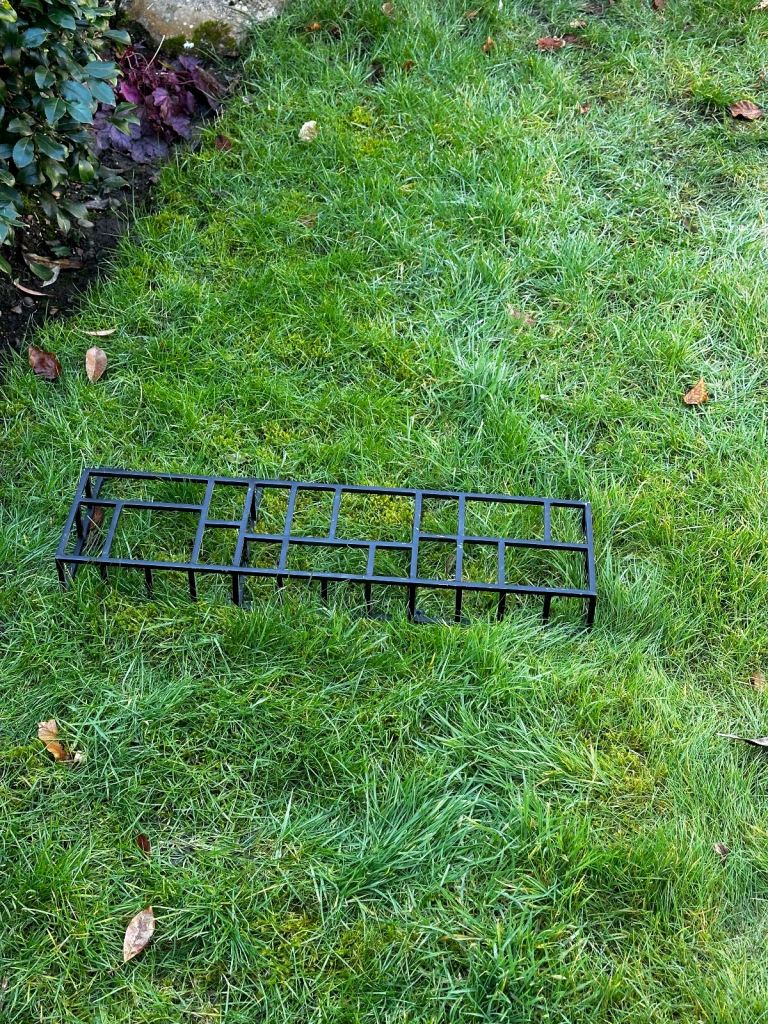 Black metal magazine rack