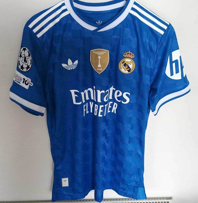 Real Madrid FC Adult medium size away top blue in colour Vini Jnr 7