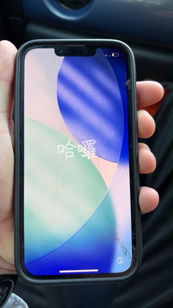 Apple iPhone in Black with Cracked Screen