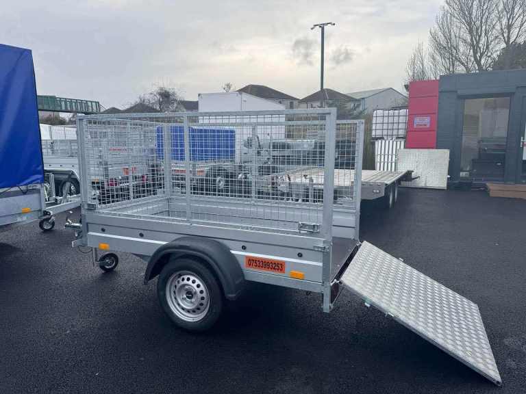 BRAND NEW 6FT X 4FT SINGLE AXLE TRAILER WITH 8OCM MESH AND RAMP 750KG
