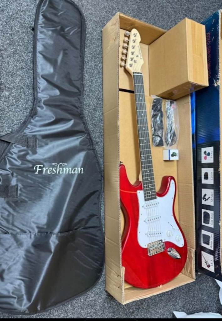 Freshman Red Electric Guitar with Gig Bag - NEW
