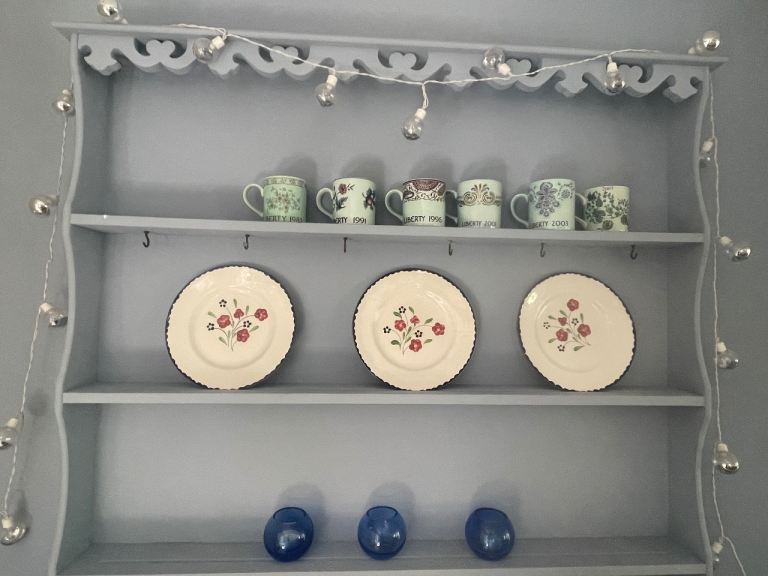 Lovely wall hung vintage plate and mug shelving / dresser top