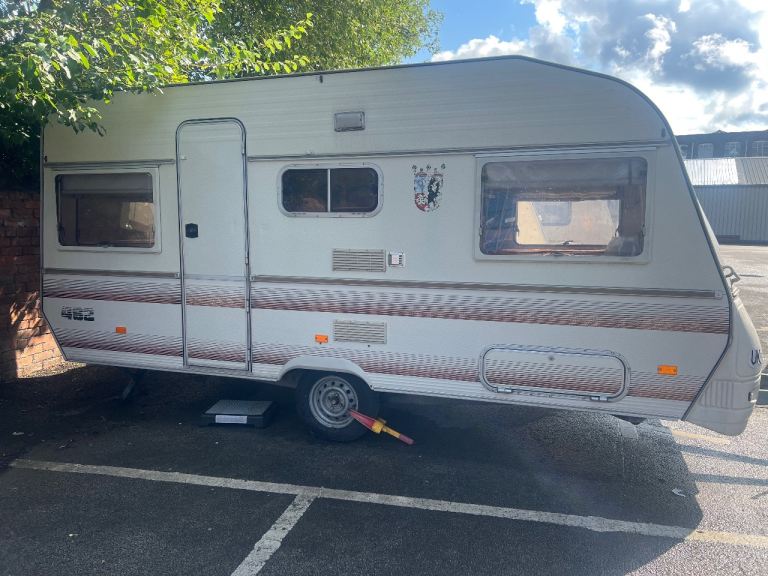 4 berth caravan with full awning. Can deliver.