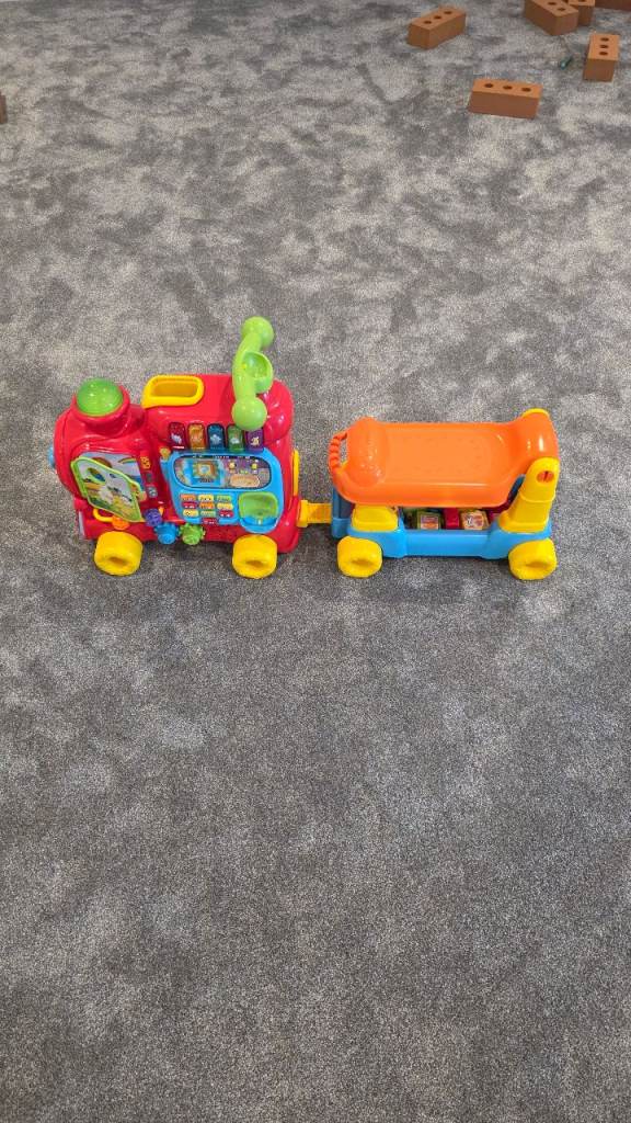 Kids toy train and trailer v tech