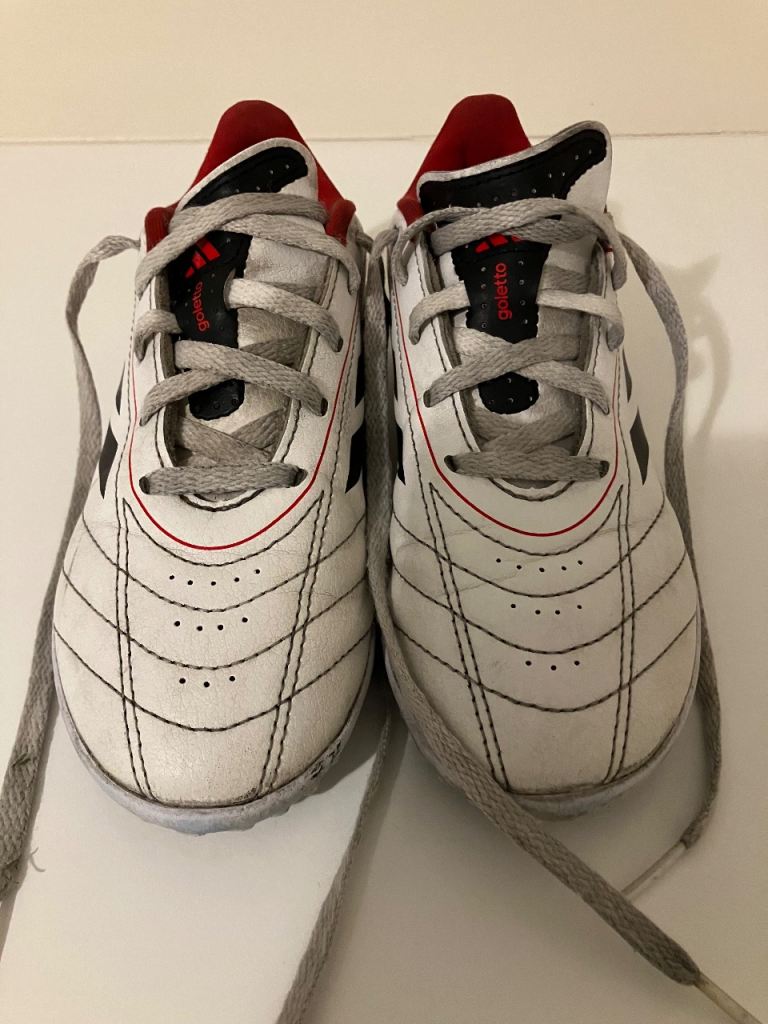 Child’s Adidas football boots