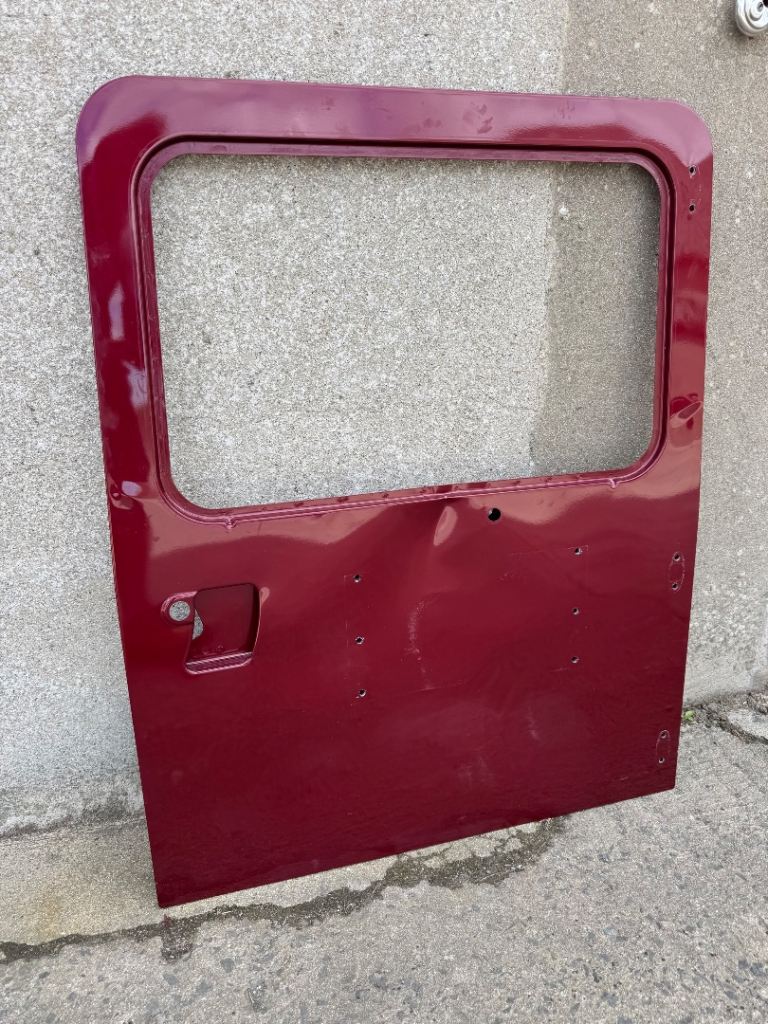 Land Rover Defender Puma OEM rear door (damaged)