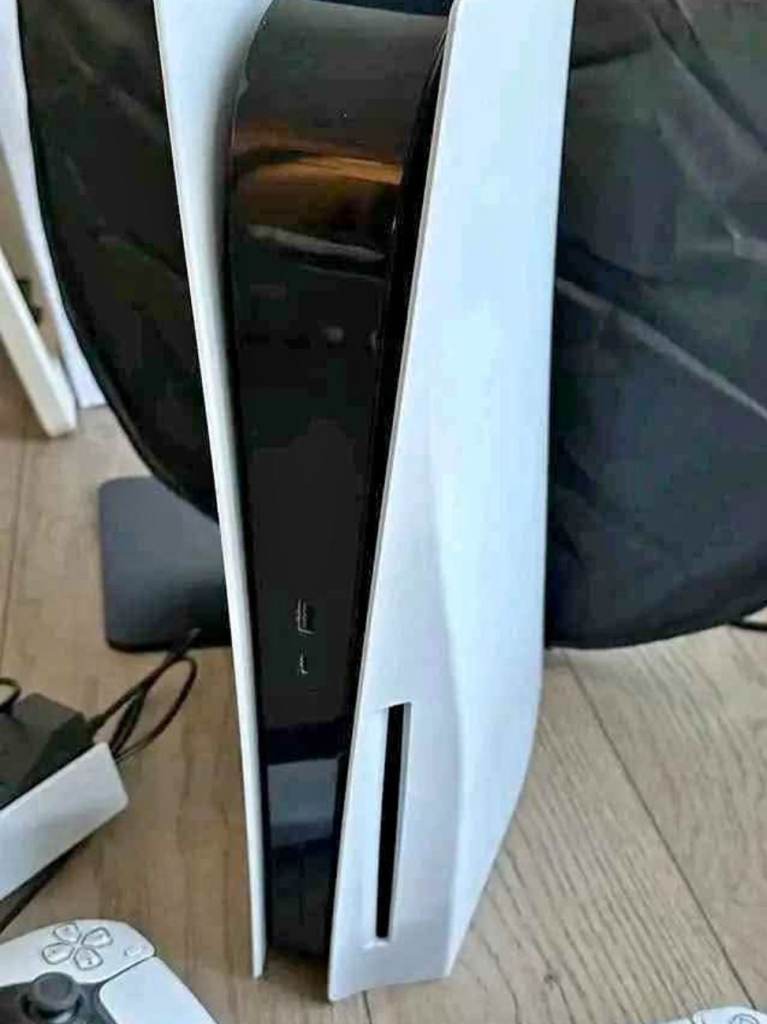 PS5 and controller and Logitech gaming headset 