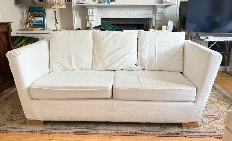 Comfy, substantial but tatty sofa