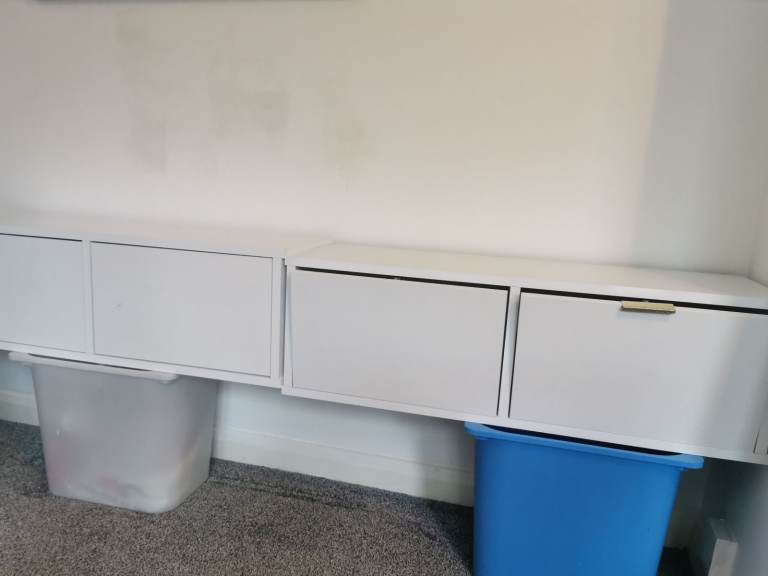 White Wall-Mounted Storage Units with doors. New unused