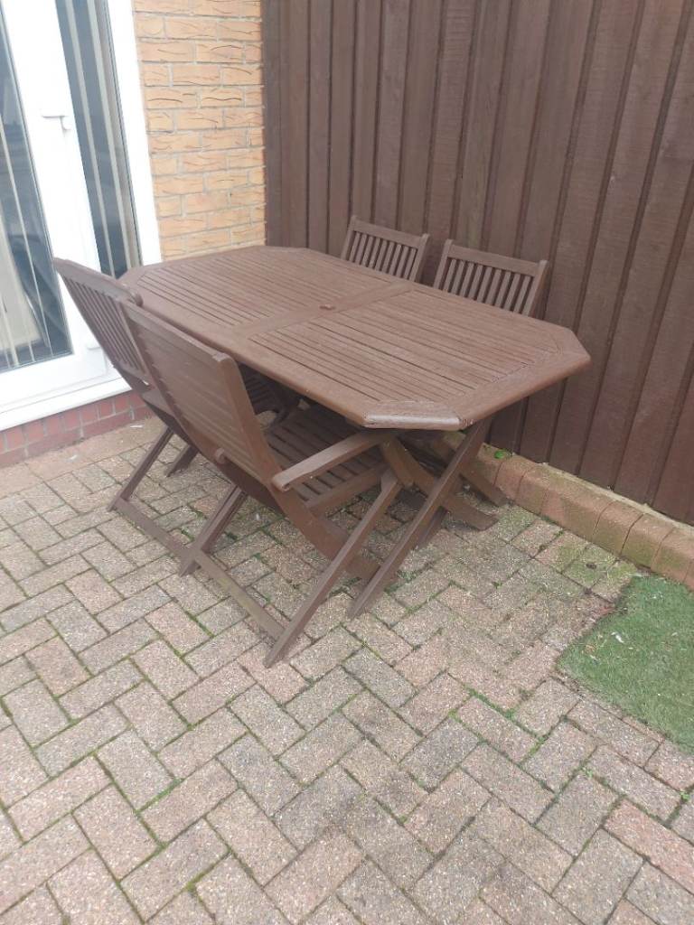 Garden wooden table and 4 chairs. £60