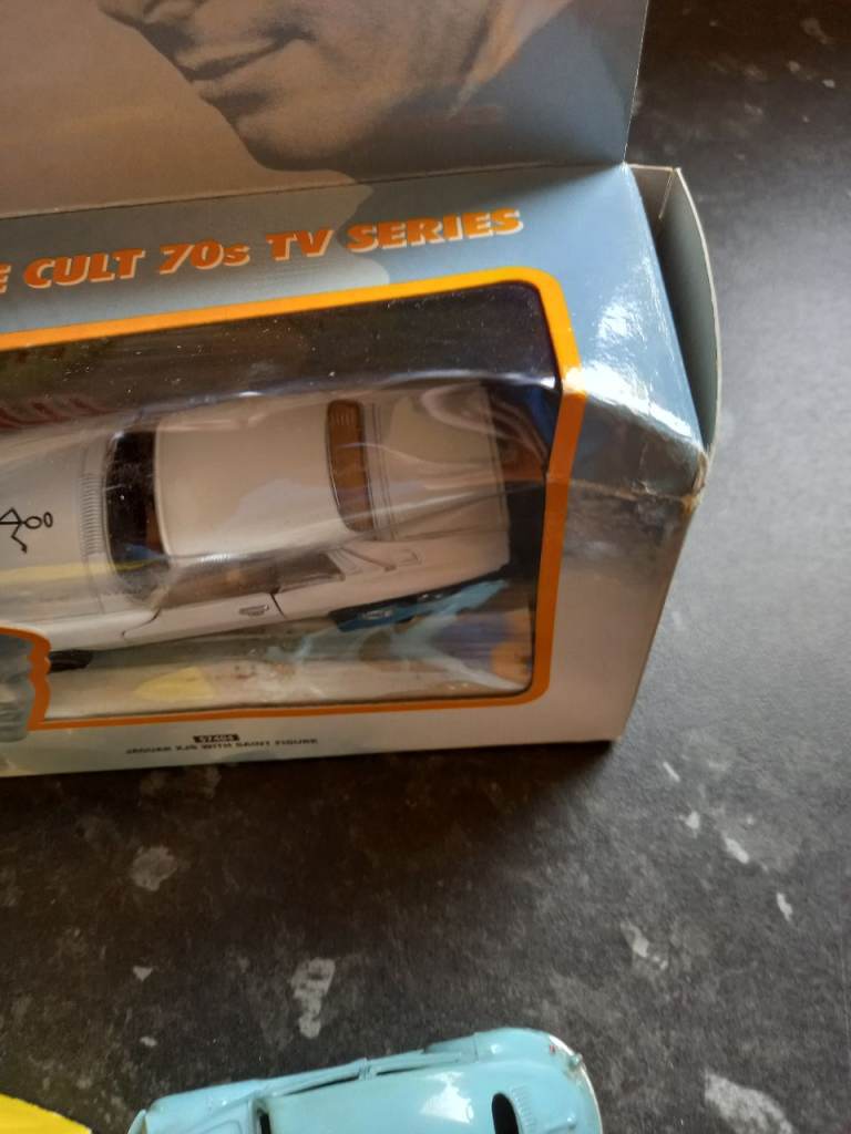 corgi return of the saint/dinky 181 volkswagen beetle model cars