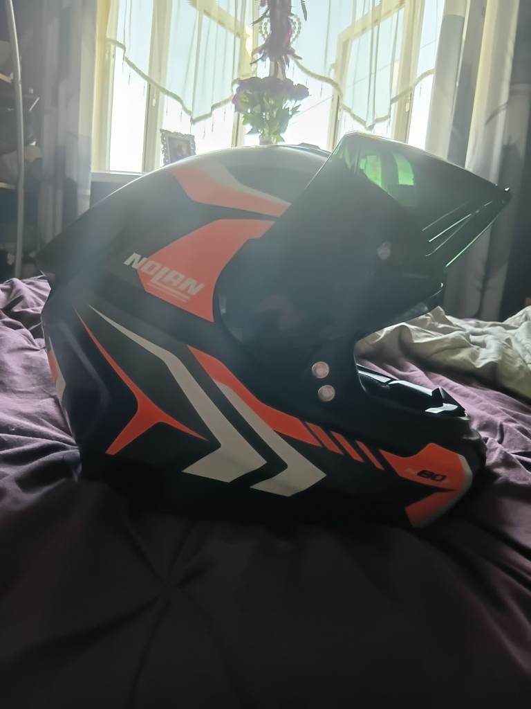 Motorbike helmet and jacket.